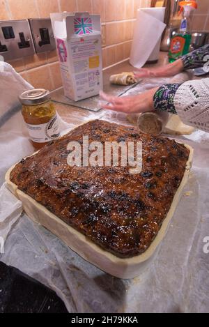 Baking a fruit cake for christmas. Stock Photo