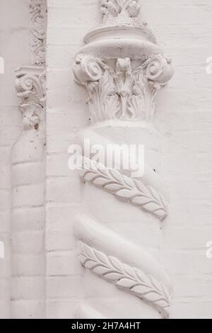 Elements of architectural decorations of buildings, gypsum stucco, wall texture, plaster ornaments and patterns Stock Photo