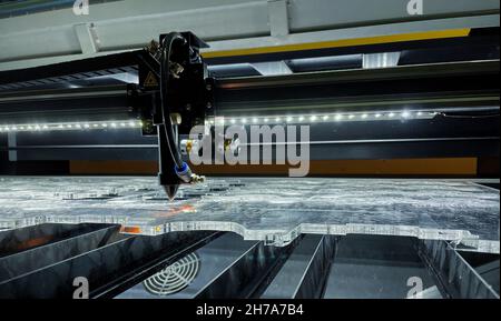 laser cutting machine in process, modern industrial technology, CNC machine Stock Photo