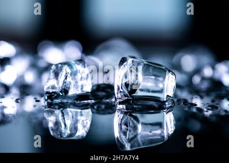 ice cubes reflection on black background. close up Stock Photo