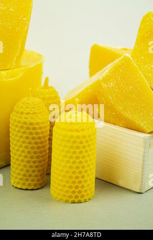 large pieces of natural beeswax, close-up, raw materials for candles Stock Photo