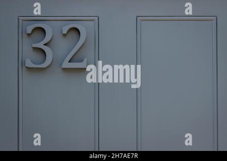 house door number 32 with simple lines Stock Photo