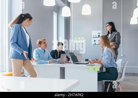Colleagues during meeting in office. Business professionals collaborating. Stock Photo