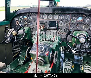 Restored vintage B-24 Liberator cockpit and controls, a WWII bomber aircraft. Stock Photo