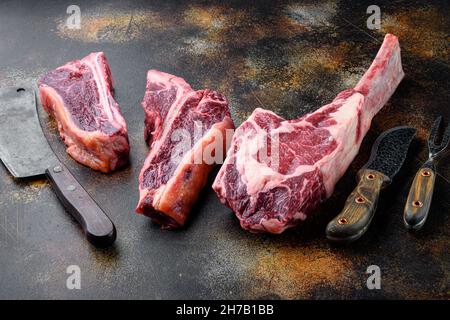 Various cuts of meat dry aged beef set, tomahawk, t bone or porterhouse and club  steak, on black wooden table background, top view flat lay, with copy Stock  Photo - Alamy