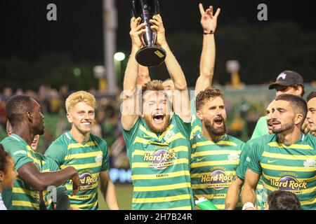 St. Petersburg, FL USA;  Tampa Bay Rowdies forward Zach Steinberger (8) with the trophy surrounded by Laurence Wyke (27) holds the trophy and is surro Stock Photo