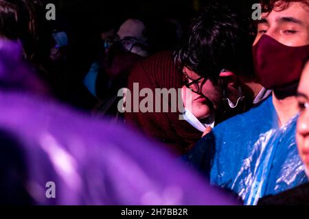 Fans enjoy bands during the first day of the 'IDARTES 10 AÑOS' musical festival that carries rock, metal, punk, salsa and hip hop music across two weekends (20-21 and 27-28 of November) at the Simon Bolivar Park and Scenario 'La Media Torta' in Bogota, Colombia on November 20, 2021. Stock Photo