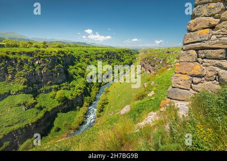 Old Armenian Lori Berd fortress wall and picturesque canyon and gorge carved into the rocks by Urut and Dzoraget River Stock Photo