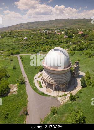 Aerial view of old soviet observatory in the city of Byurakan, Armenia. Located high in mountains on the slope of ancient volcano Aragats Stock Photo