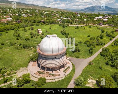 Aerial view of old soviet observatory in the city of Byurakan, Armenia. Located high in mountains on the slope of ancient volcano Aragats Stock Photo