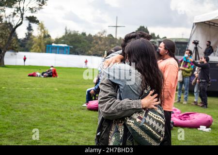 Concert goers enjoy, dance and chant to salsa cocke, salsa, cumbia and jazz during the second day of the 'IDARTES 10 AÑOS' musical festival that carries rock, metal, punk, salsa and hip hop music across two weekends (20-21 and 27-28 of November) at the Simon Bolivar Park and Scenario 'La Media Torta' in Bogota, Colombia on November 21, 2021. Stock Photo