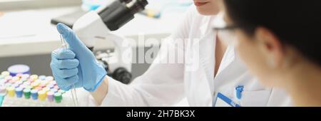 Two scientists conducting research in chemical laboratory Stock Photo