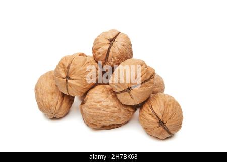 Walnuts heap isolated on a white background Stock Photo