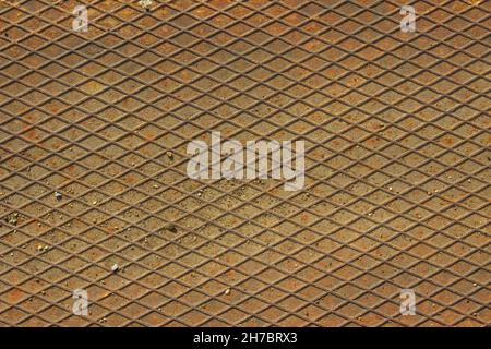 Texture of old rusty, grunge anti-slip floor plate in industrial style Stock Photo