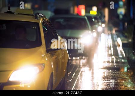 Cars on night street, rain Stock Photo