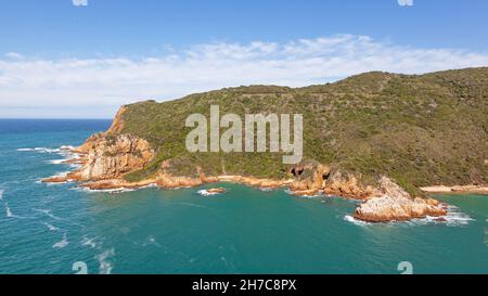 The western head of the iconic Knysna Heads inlet in South Africa's Garden Route. Stock Photo