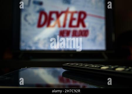 Dexter Tv series and TV controller. Dexter: New Blood is an American crime drama mystery miniseries developed for Showtime as a continuation of the se Stock Photo