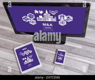M&a concept shown on different information technology devices Stock Photo