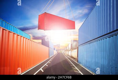Crane put container in the port view over sunset Stock Photo