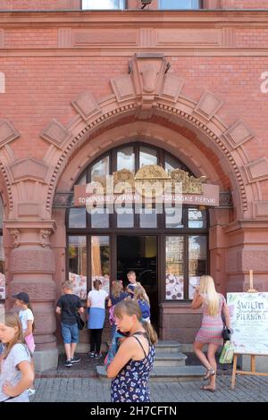 TORUN, POLAND - 07 August 2021: Kopernik sweet store in market square city in Torun Stock Photo