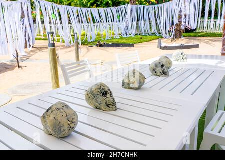 Mauritius Island - 31.10.2021 Decorative skulls on the tables. Halloween decoration in the hotel for Halloween party for children. High quality photo Stock Photo