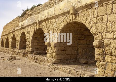 Roman aqueduct in Caesarea Maritima , Israel, Caesarea Stock Photo