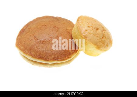 Pan cake double layer and cup cake isolated on a white background with copy space for text. Stock Photo