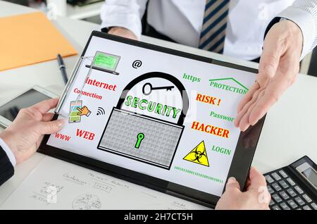 Data security concept shown by a businessman Stock Photo