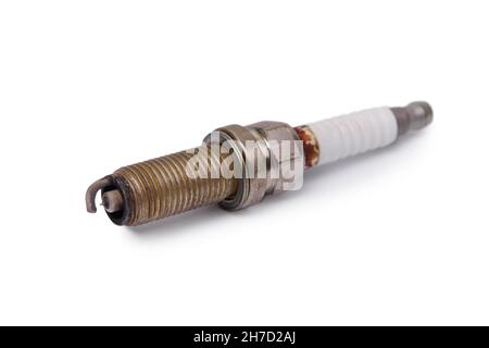 Old used spark plug isolated on white background Stock Photo