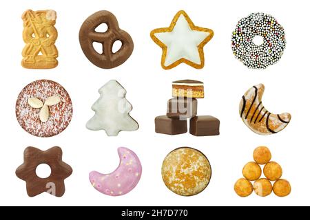 Various Christmas cakes and sweets isolated against white background Stock Photo