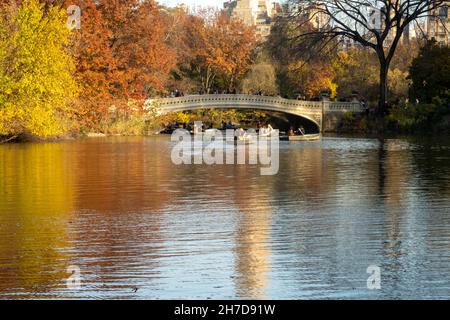 Bow Bridge and fall colors in Central Park with Manhattan Upper West ...