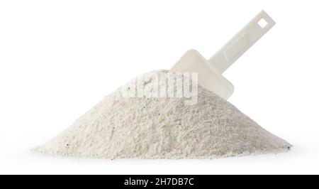 pile of detergent powder with measuring spoon isolated on white background Stock Photo