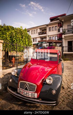 OHRID, NORTH MACEDONIA - August 25, 2021: Illustrative editorial image of an old Citroen 2CV parked in Ohrid, North Macedonia. Citroen 2CV is a French Stock Photo