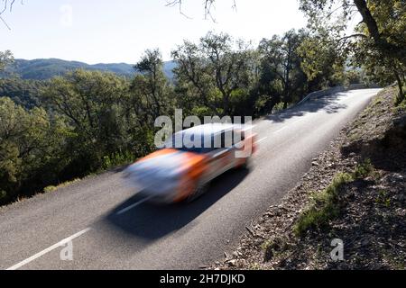 Rally car taking part in the timed section of the Rally Costa Brava 2021 in Girona, Spain Stock Photo