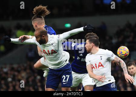 London, UK. 21st Nov, 2021. Kalvin Phillips of Leeds Utd (c) and Lucas Moura of Tottenham Hotspur (27) jump for a header. Premier League match, Tottenham Hotspur v Leeds Utd at the Tottenham Hotspur Stadium in London on Sunday 21st November 2021. this image may only be used for Editorial purposes. Editorial use only, license required for commercial use. No use in betting, games or a single club/league/player publications. pic by Steffan Bowen/Andrew Orchard sports photography/Alamy Live news Credit: Andrew Orchard sports photography/Alamy Live News Stock Photo