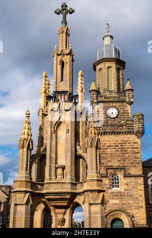 On Forres High Street, the Mercat Cross with the Forres Tolbooth in the background Stock Photo