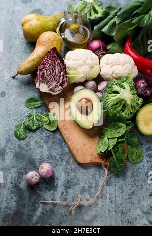 Various vegetables with pears and olive oil Stock Photo