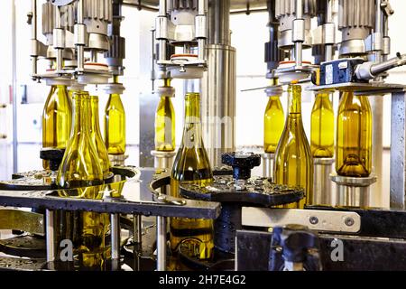 Wine Bottles in Bottling Plant at Marques de Riscal Winery in Rioja, Spain Stock Photo