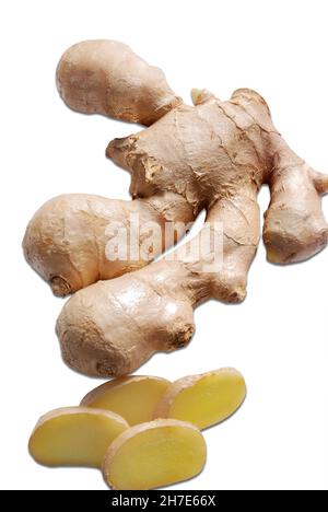 Fresh ginger rhizome with sliced pieces, isolated on a white background Stock Photo