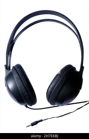 Ordinary black headphones with a jack isolated on a white background Stock Photo
