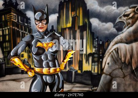 From the Colored Bodies Calendar 2022 - Geek Art-Bodypainting and Transformaking: Batgirl Comic photoshooting with Janina in the Duesterwald studio in Hamelin. A project by the photographer Tschiponnique Skupin and the bodypainter Enrico Lein.