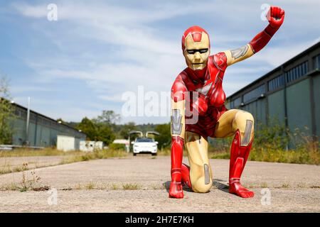 From the Colored Bodies Calendar 2022 - Geek Art-Bodypainting and Transformaking: Iron Woman Photoshooting with Renée Meinhold on the elektroma site in Hamelin. A project by the photographer Tschiponnique Skupin and the bodypainter Enrico Lein.