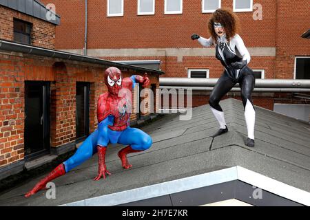 From the Colored Bodies Calendar 2022 - Geek Art-Bodypainting and Transformaking: Spider-Man and Spider-Gwen photoshooting with Patrick and Lena at the Hefehof in Hamelin. A project by the photographer Tschiponnique Skupin and the bodypainter Enrico Lein.
