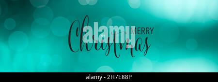Merry Christmas Banner. Panoramic Holidays background with bokeh. Stock Photo