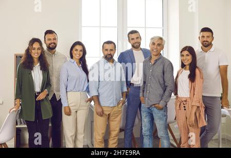 Portrait of a diverse, friendly, positive and successful team of employees in the office. Stock Photo