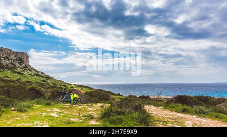 Beautiful valley by the sea. Trail leading along the coast. Seascape in Cyprus Ayia Napa. Cape Greco peninsula, national forest park Stock Photo