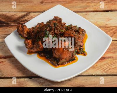 Assorted indian food Chicken roast on wooden background. Dishes and appetizers of indian cuisine, selective focus Stock Photo