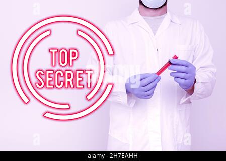 Text showing inspiration Top Secret. Word for protected by a high degree of secrecy Highly confidential Chemist Presenting Blood Sample, Scientist Stock Photo