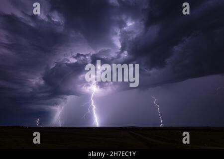 Lightning strikes in the night sky from a strong thunderstorm near Oelrichs, South Dakota Stock Photo