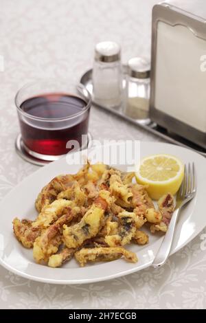 Cantabrian fried squid, rabas de calamar Stock Photo - Alamy